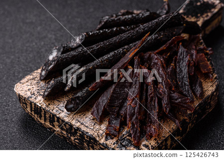 Horse meat sausage with salt, spices and herbs 125426743