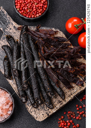 Horse meat sausage with salt, spices and herbs Horse meat sausage with salt, spices and herbs 125426748