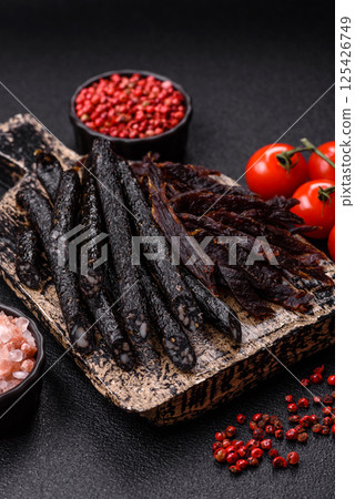 Horse meat sausage with salt, spices and herbs Horse meat sausage with salt, spices and herbs 125426749