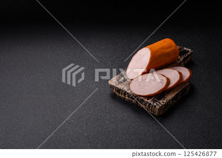 Delicious fresh boiled chicken or pork sausage cut into slices 125426877