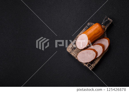 Delicious fresh boiled chicken or pork sausage cut into slices 125426878