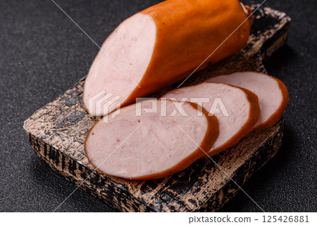 Delicious fresh boiled chicken or pork sausage cut into slices 125426881