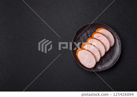 Delicious fresh boiled chicken or pork sausage cut into slices 125426894