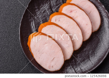 Delicious fresh boiled chicken or pork sausage cut into slices Delicious fresh boiled chicken or pork sausage cut into slices 125426898