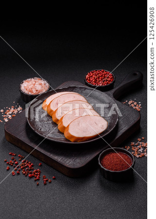 Delicious fresh boiled chicken or pork sausage cut into slices 125426908