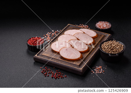 Delicious fresh boiled chicken or pork sausage cut into slices 125426909