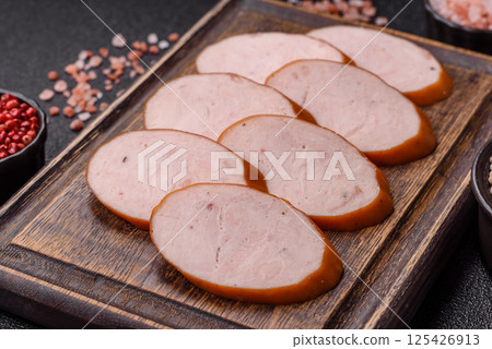 Delicious fresh boiled chicken or pork sausage cut into slices 125426913
