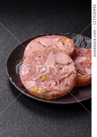 Homemade brawn with salt, spices, herbs and vegetables Homemade brawn with salt, spices, herbs and vegetables 125426948