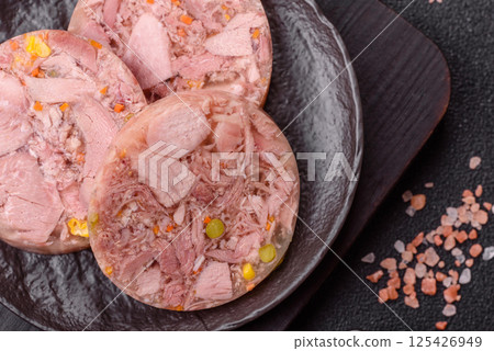 Homemade brawn with salt, spices, herbs and vegetables Homemade brawn with salt, spices, herbs and vegetables 125426949