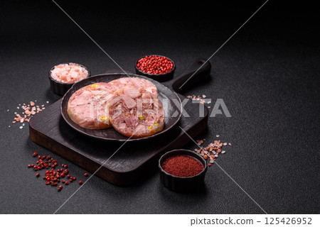 Homemade brawn with salt, spices, herbs and vegetables 125426952