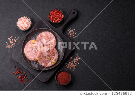 Homemade brawn with salt, spices, herbs and vegetables 125426953