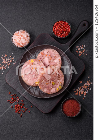 Homemade brawn with salt, spices, herbs and vegetables 125426954