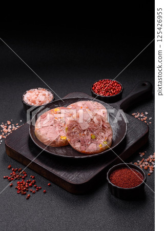 Homemade brawn with salt, spices, herbs and vegetables 125426955