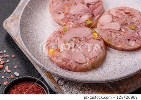 Homemade brawn with salt, spices, herbs and vegetables 125426962