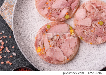 Homemade brawn with salt, spices, herbs and vegetables 125426963