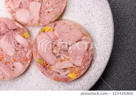 Homemade brawn with salt, spices, herbs and vegetables 125426968