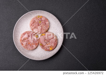 Homemade brawn with salt, spices, herbs and vegetables 125426972