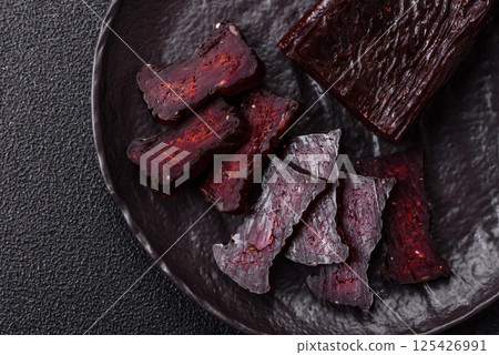 Horse meat sausage with salt, spices and herbs 125426991