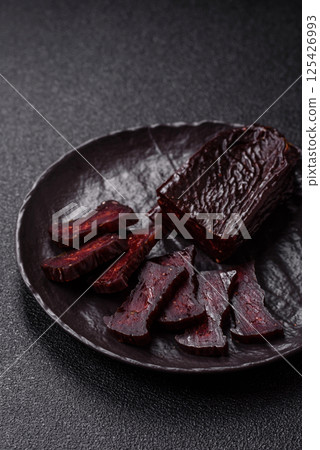 Horse meat sausage with salt, spices and herbs Horse meat sausage with salt, spices and herbs 125426993