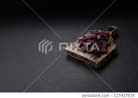 Horse meat sausage with salt, spices and herbs 125427016