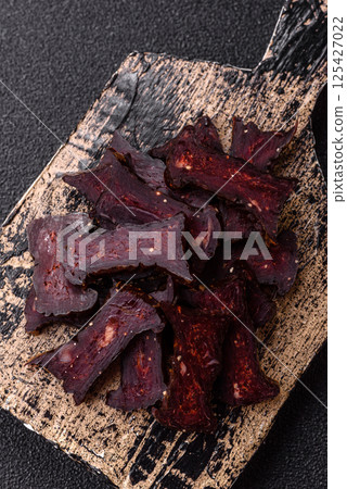 Horse meat sausage with salt, spices and herbs Horse meat sausage with salt, spices and herbs 125427022