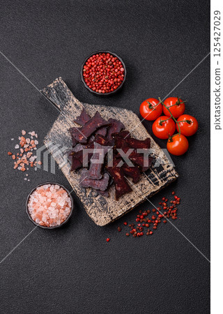 Horse meat sausage with salt, spices and herbs 125427029