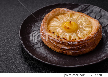 Sweet round tart with pineapple Sweet round tart with pineapple 125427035