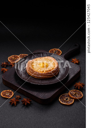Sweet round tart with pineapple Sweet round tart with pineapple 125427045