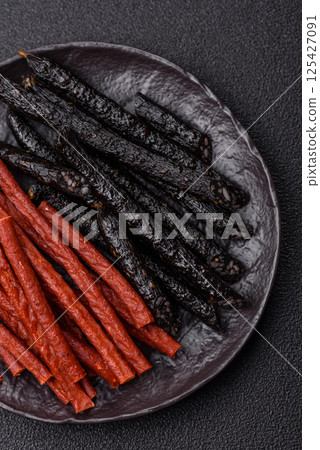 Horse meat sausage with salt, spices and herbs Horse meat sausage with salt, spices and herbs 125427091