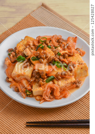 Kimchi, tofu and natto stir fry 125428027