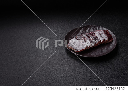 Smoked horse meat with salt, spices and herbs 125428132