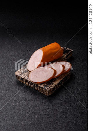 Delicious fresh boiled chicken or pork sausage cut into slices Delicious fresh boiled chicken or pork sausage cut into slices 125428149
