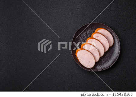 Delicious fresh boiled chicken or pork sausage cut into slices 125428163