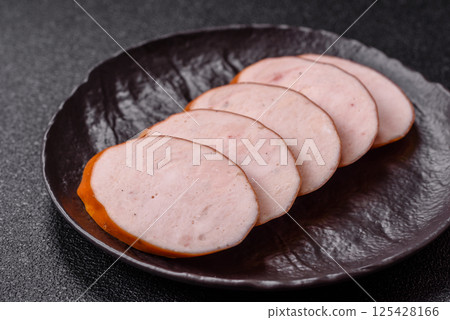 Delicious fresh boiled chicken or pork sausage cut into slices Delicious fresh boiled chicken or pork sausage cut into slices 125428166
