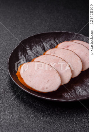 Delicious fresh boiled chicken or pork sausage cut into slices Delicious fresh boiled chicken or pork sausage cut into slices 125428169