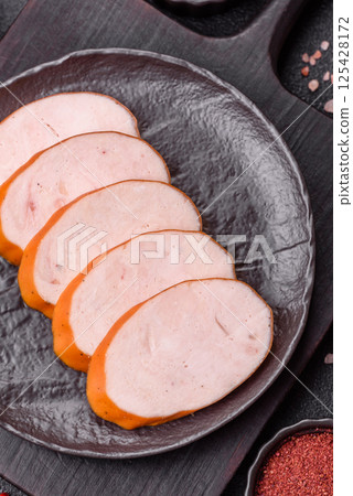Delicious fresh boiled chicken or pork sausage cut into slices Delicious fresh boiled chicken or pork sausage cut into slices 125428172