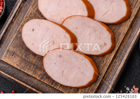 Delicious fresh boiled chicken or pork sausage cut into slices 125428183