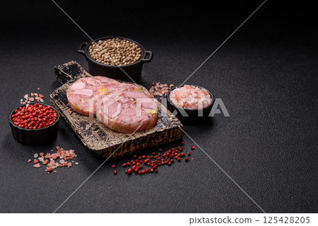 Homemade brawn with salt, spices, herbs and vegetables Homemade brawn with salt, spices, herbs and vegetables 125428205