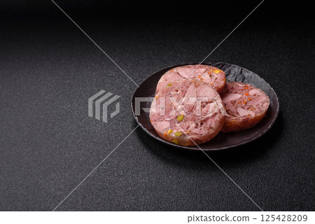 Homemade brawn with salt, spices, herbs and vegetables Homemade brawn with salt, spices, herbs and vegetables 125428209