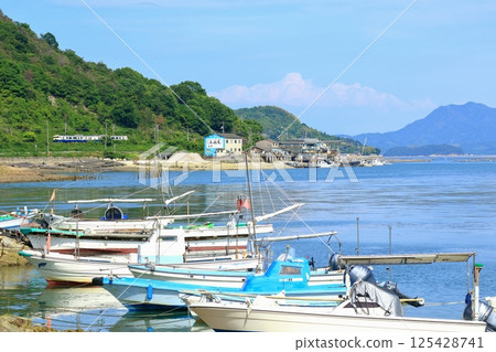 A tourist train runs along the coast of Setouchi A tourist train runs along the coast of Setouchi 125428741