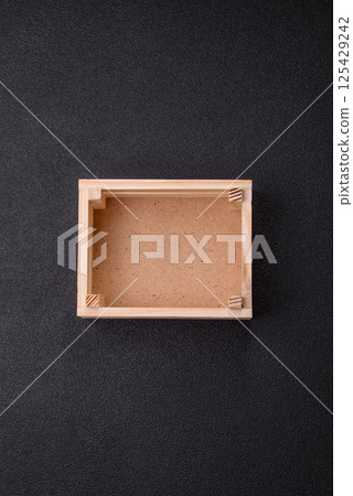 Empty wooden box for fruits or vegetables 125429242