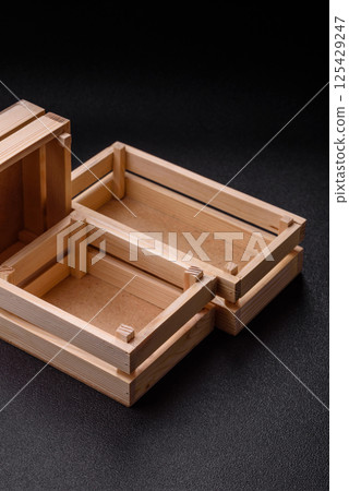 Empty wooden box for fruits or vegetables 125429247