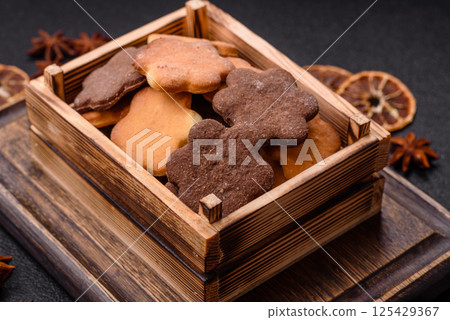Ginger sweet cookies in yellow and brown color 125429367