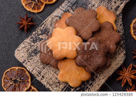 Ginger sweet cookies in yellow and brown color 125429380