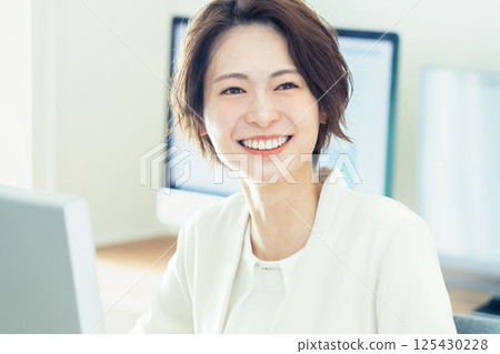 Businesswoman working with digital transformation tools 125430228