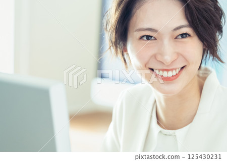 Businesswoman working with digital transformation tools 125430231