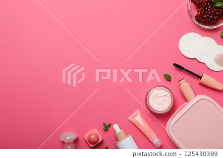 Self care and skincare products concept - pomegranate cosmetics Self care and skincare products concept - pomegranate cosmetics 125430399