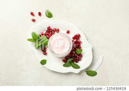 Self care and skincare products concept - pomegranate cosmetics 125430419