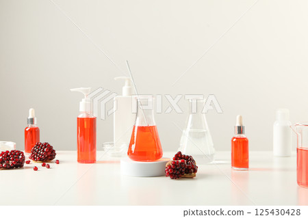 Self care and skincare products concept - pomegranate cosmetics 125430428