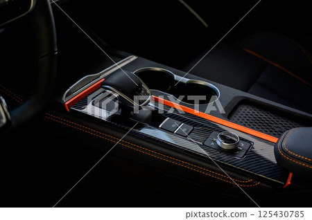 Automatic transmission selector in the interior of a modern car. 125430785